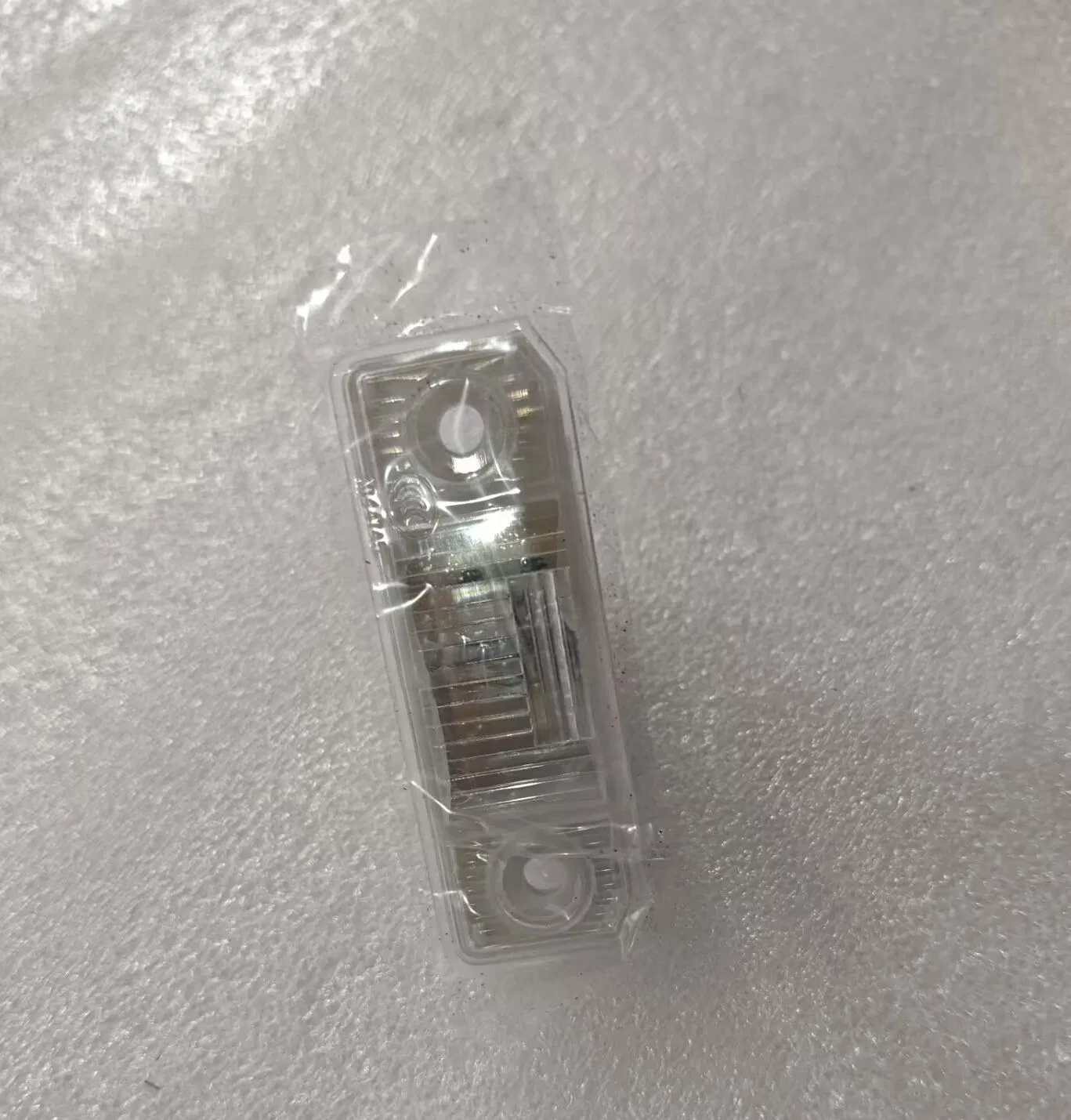 Фонарь подсветки заднего номерного знака Maxus C00058495