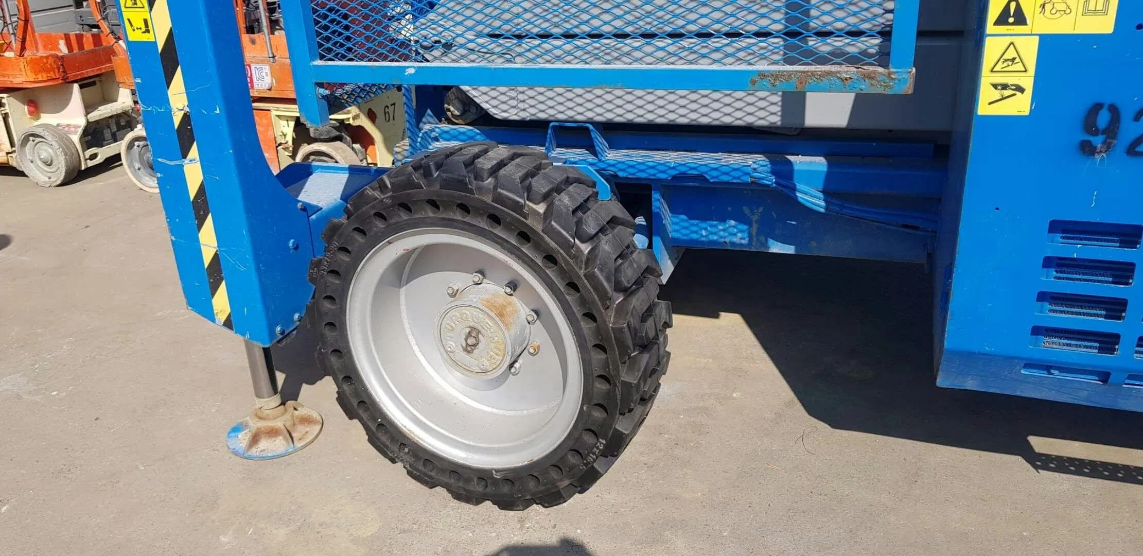 Genie GS5390 Scissor Lift Solid Tires 12-16.5 with Rim