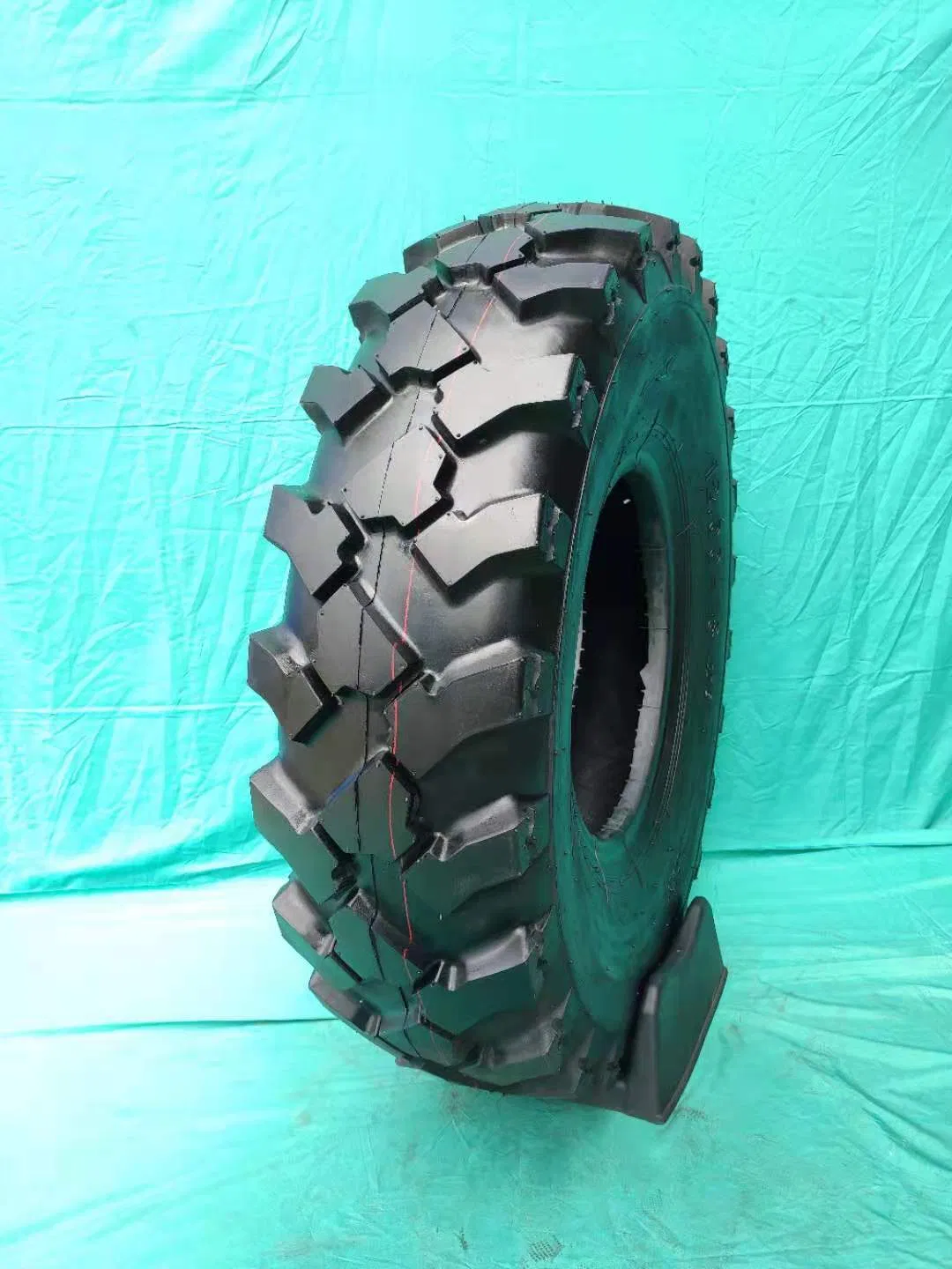 Шина 16.9-28-14 TL TI200 для экскаватора-погрузчика