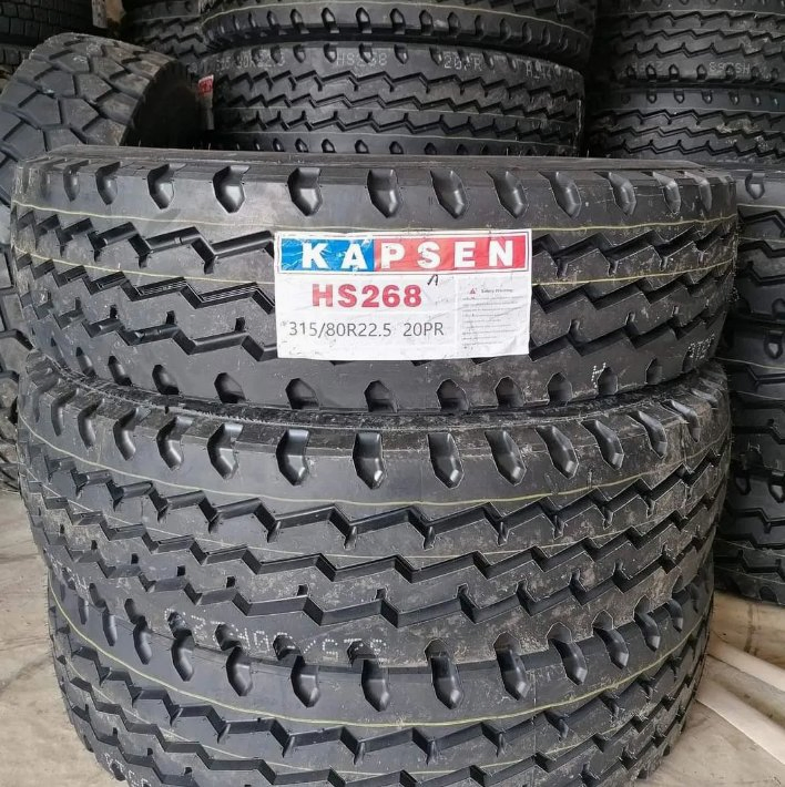 All-Steel Radial Truck Drive Tire with Deep Tread Pattern for Wear Resistance, Suitable for Long-Haul Heavy-Duty Freight.